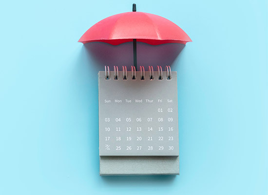 calendar with umbrella over the top