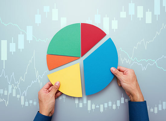 someone piecing together a pie chart