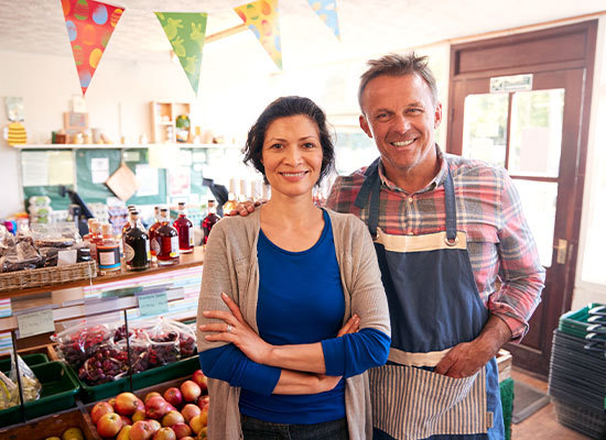 husband and wife in a store they own