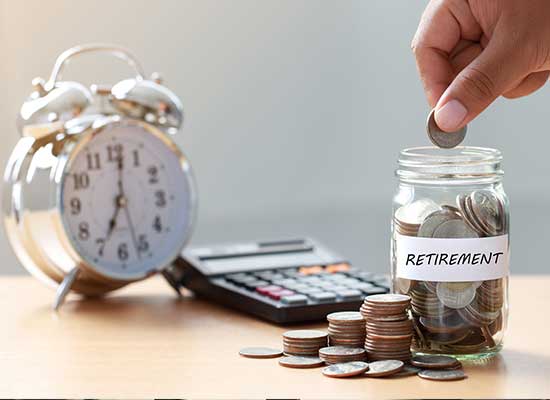 A hand adding coins to a 'Retirement' jar next to a clock and calculator symbolizes saving for retirement, crucial for self-employed individuals using SEP IRAs, Solo 401(k)s, and HSAs.