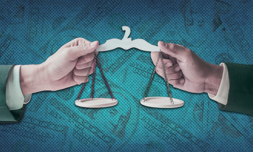 -Two hands delicately holding a balanced scale against a serene blue background