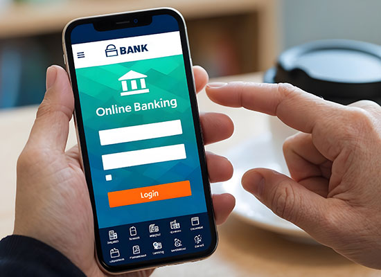 A person using a mobile banking app on a smartphone, highlighting the shift to online banking, digital transactions, and modern financial services.