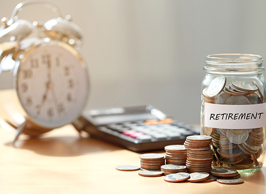 A jar labeled 'Retirement' filled with coins, accompanied by a clock and a calculator, symbolizing retirement planning and the financial challenges caregivers face.