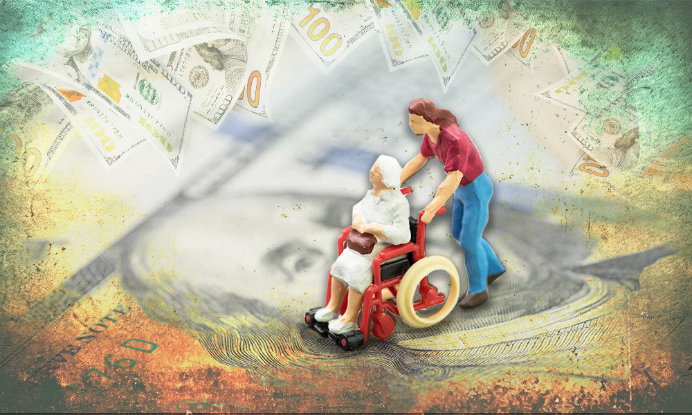 small sculpture of someone pushing an elder in a wheelchair