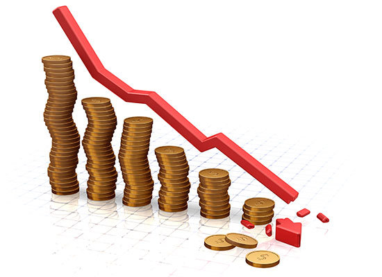 Coins stacked high in iteration showing a downward trend