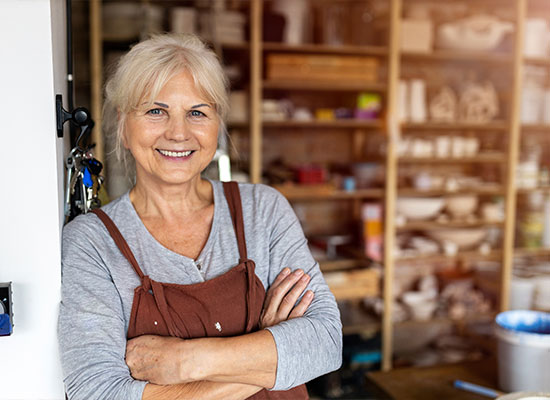 a business owner continuing to work after retirement because of inflation 