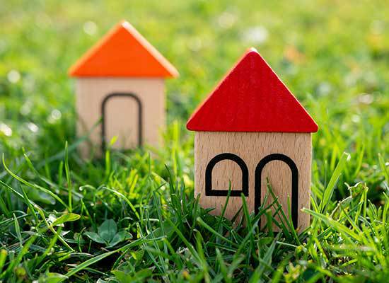 minature houses in the grass