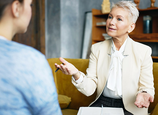 an older female consulting a younger female
