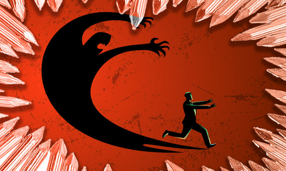 person running from his own scary shadow