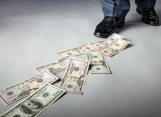 person following a trail of money