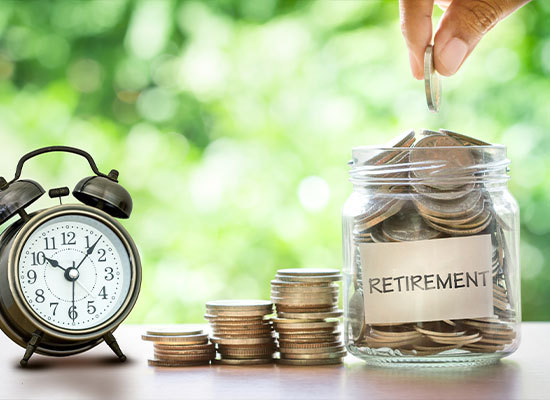 retirement savings jar filled with coins