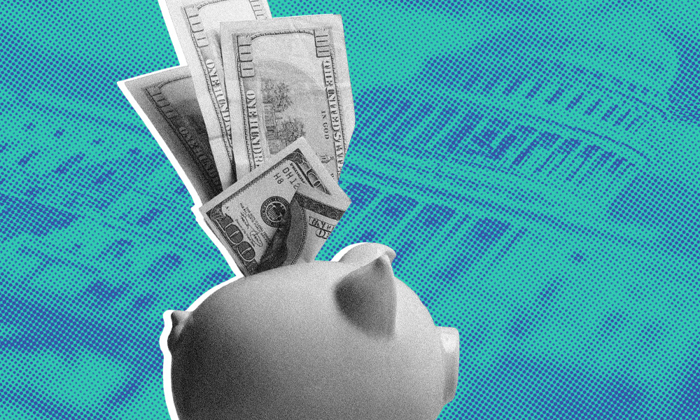 A piggy bank with dollar bills emerging from it is set against a blue-green background featuring a faint image of the U.S. Capitol building