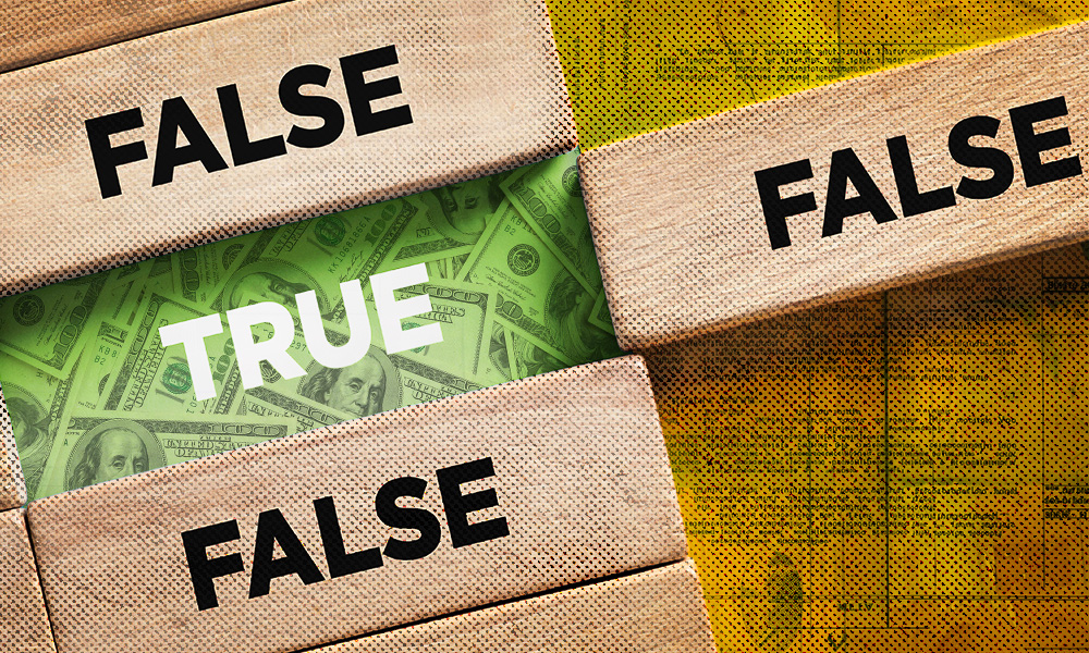 A metaphorical image of wooden blocks labeled 'FALSE' being removed to reveal 'TRUE' over a background of money