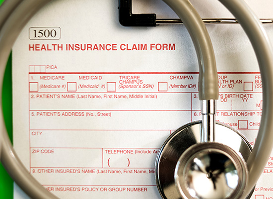 A close-up of a health insurance claim form with a stethoscope, highlighting Medicare coverage and health care costs in retirement.