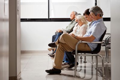 People in waiting room at doctor's office