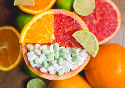 Grapefruit with vitamin supplements in one half