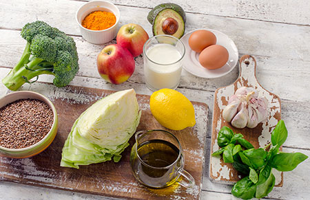 Liver healthy foods laid out on a table