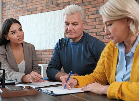 people going over a Health Savings Account Document