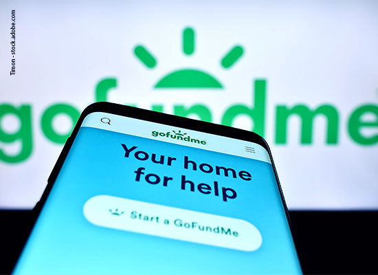 A smartphone displaying the gofundme homepage with the text 'your home for help' and a 'start a gofundme' button