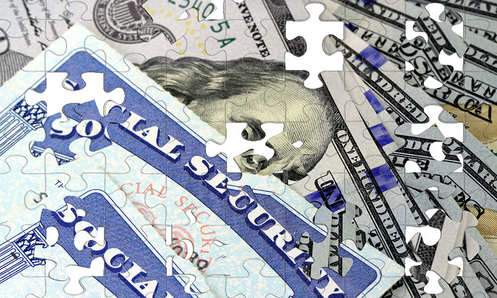 a puzzle consisting of a social security card and money