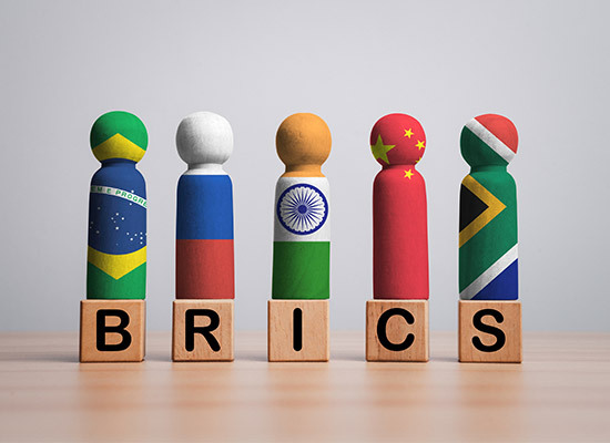 wooden toy blocks spelling out BRICS
