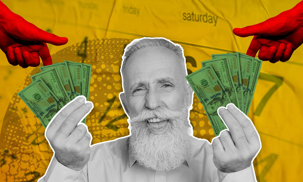man smiling holding money in each hand