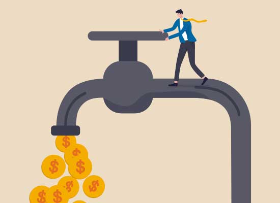 A person turning on a faucet that is pouring out gold coins, symbolizing guaranteed income from annuities.