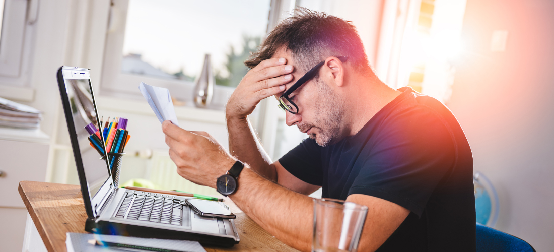 A man stressed out over his debt