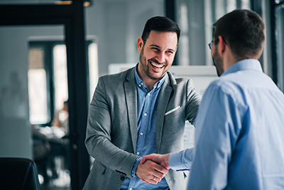 Man shaking hands with his financial advisor