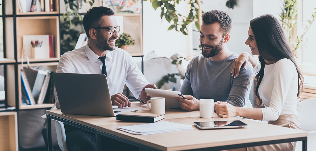 Couple receiving financial advice from professional