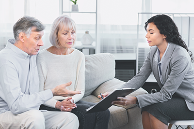 Senior couple receiving financial advice