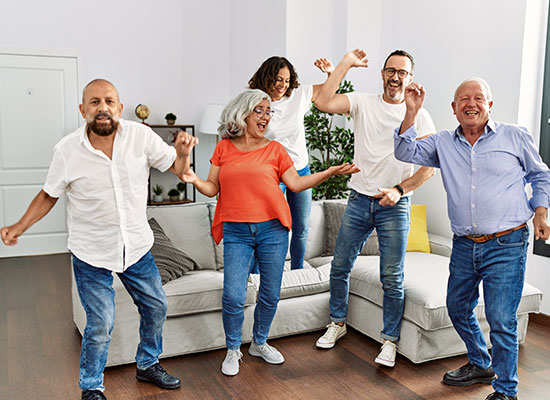 elder adults dancing in a group together