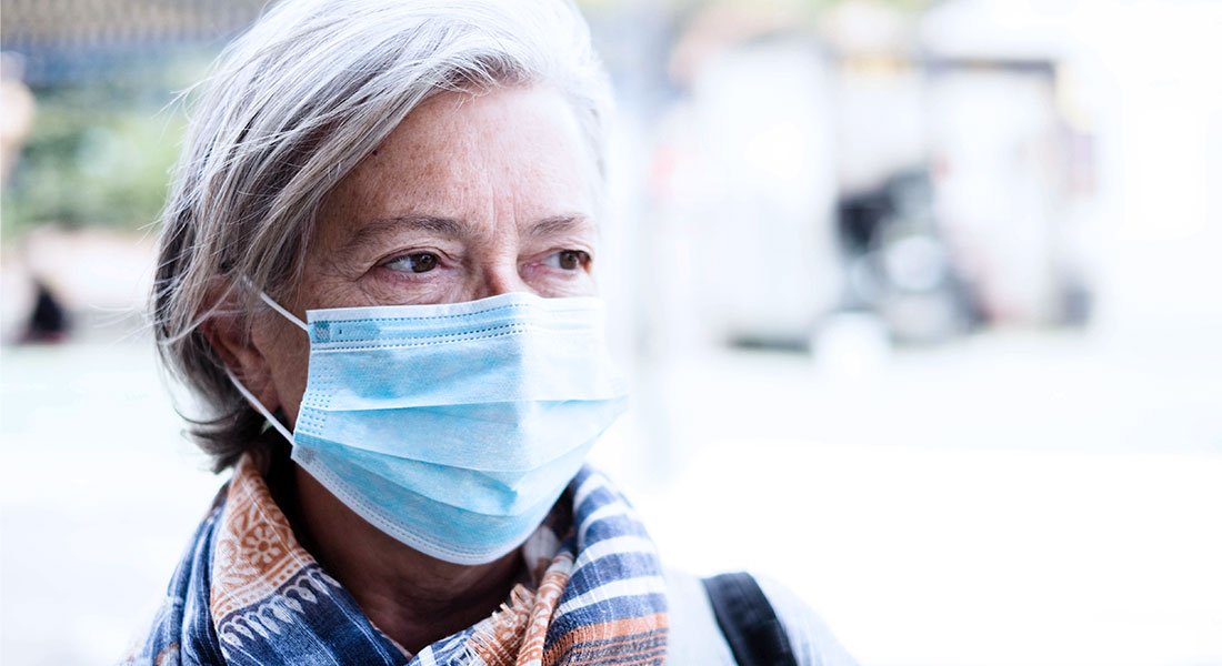 A woman with a mask on