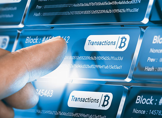 digital button labeled BlockChain Transaction