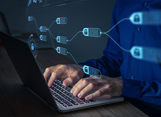 someone typing on laptop searching blockchains