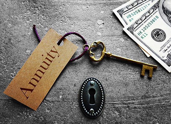 A labeled key with "Annuity" written on it sits next to cash and a keyhole, representing annuities as a tool for guaranteed income in retirement.