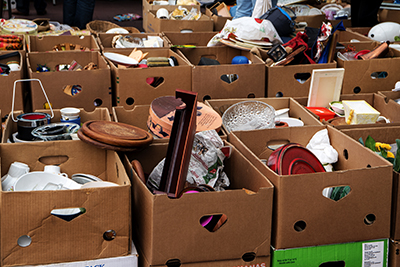 Donated items in cardboard boxes