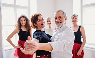 Senior couple taking a dance class