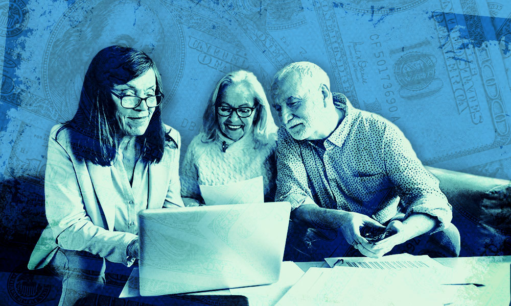 Senior couple going over taxes with an advisor