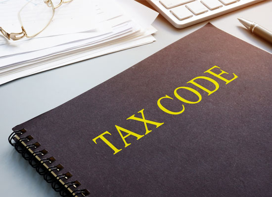 Tax code book highlighting estate tax exemption strategies
